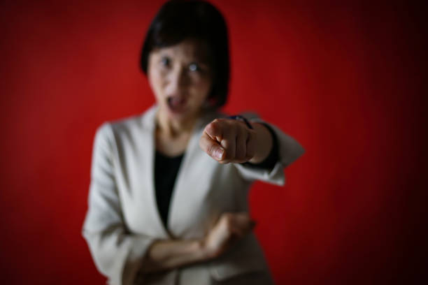 Image of a female boss scolding her subordinates