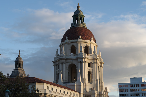 Image showing the iconic Pasadena City Hall in Los Angeles county. Image taken against a cloudy sky after a storm. This landmark is listed in the National Register of Historic Places.