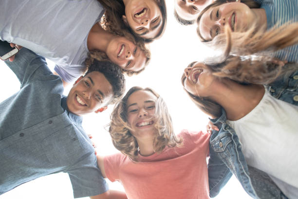 istock Teenagers Huddled Outside 1382646555