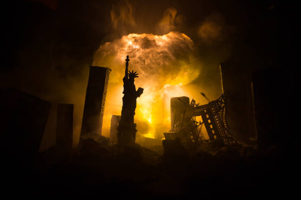 Nuclear war concept. Explosion of nuclear bomb. Apocalyptic view of city downtown after bombing. Night scene. City destroyed by war.