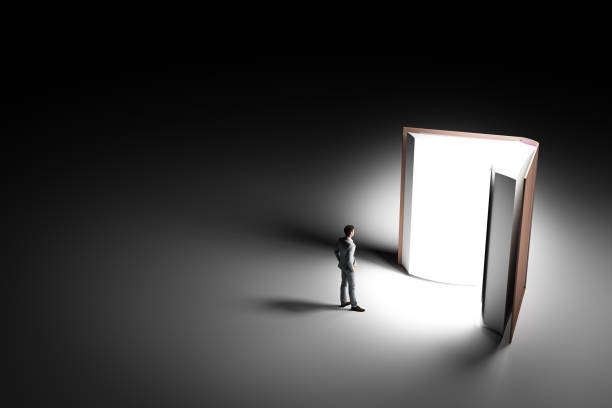 istock 3D illustration young businessman standing in front of a large book. 3D rendering 1382660209