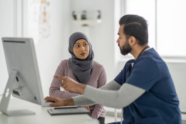istock Reviewing Test Results with a Muslim Patient 1382661913