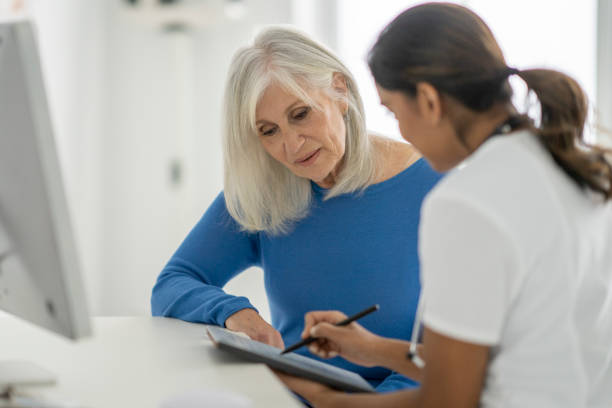 istock Reviewing Test Results with a Senior Patient 1382661921