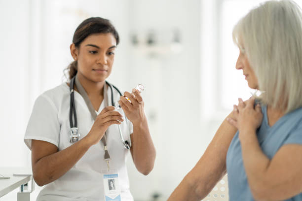 istock Nurse Preparing a Vaccine 1382661927