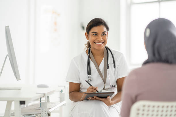 istock Muslim Woman at the Doctors 1382661936