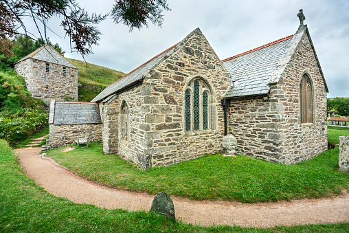 Grade 1 listed,Church of England,of historic interest,dated back to the 13th century,built to a three hall design and known as the Church of Storms due to it's exposed location,close to Truro.