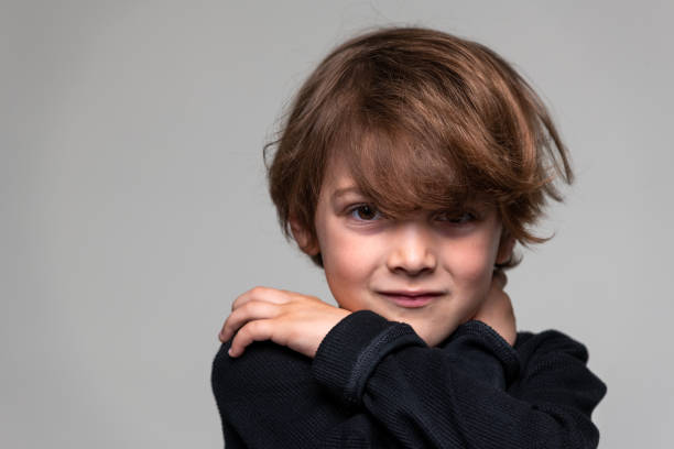 istock Smiling little boy looking at the camera 1382696931