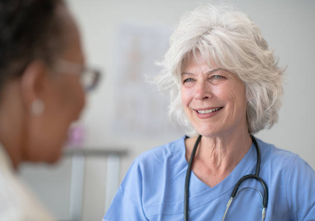 istock Doctor with a Senior Patient 1382698812