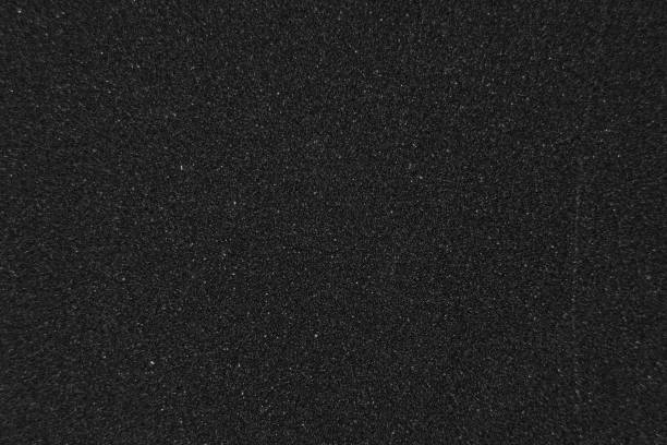 istock dark abstract texture design. grungy frame in black background. 1382701094