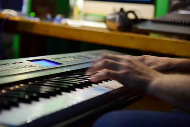 istock Fingers hands man play musical instrument 1382702231