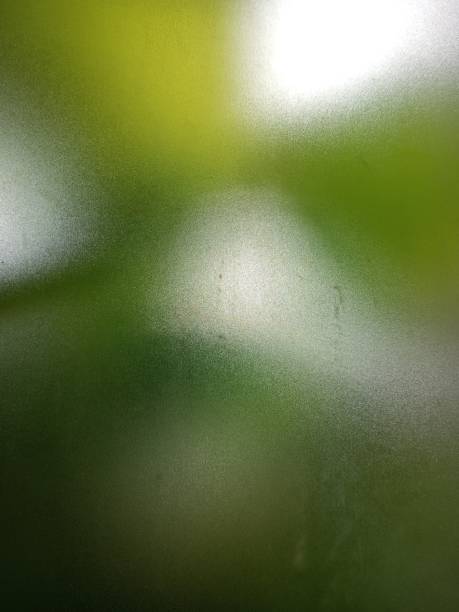 istock Abstract green summer bokeh background, gradient view art texture glow 1382708217