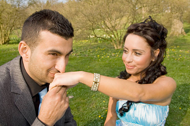 Happy couple close up portrait outdoors