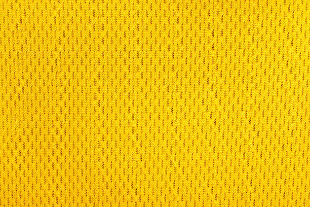 jaune texture de tissu de nylon polyester sportswear. - jersey en matière textile photos et images de collection