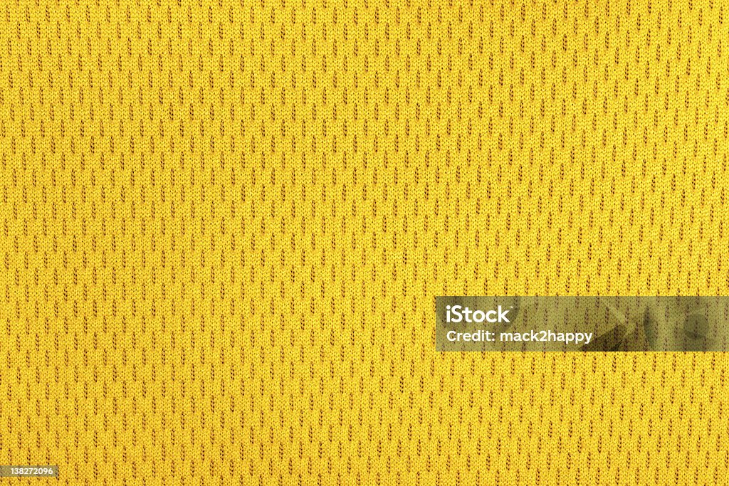 yellow polyester nylon sportswear texture. yellow polyester nylon sportswear shorts to created a textured background. Sport Stock Photo