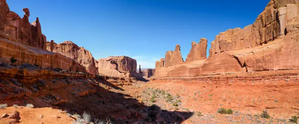 Panoramic view of the imposing sandstone rock formations along Park Avenue in Arches National Park near Moab Utah