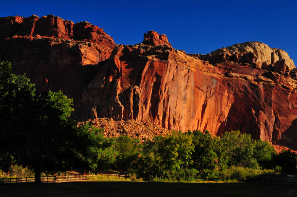Sunrise on the sandstone canyon walls around Fruita, Capitol Reef National Park, Utah, Southwest USA