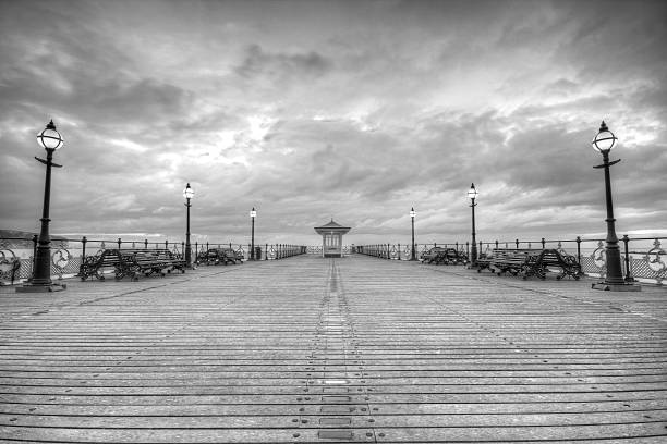 istock Sky over swanage pier in monochrome 138275142