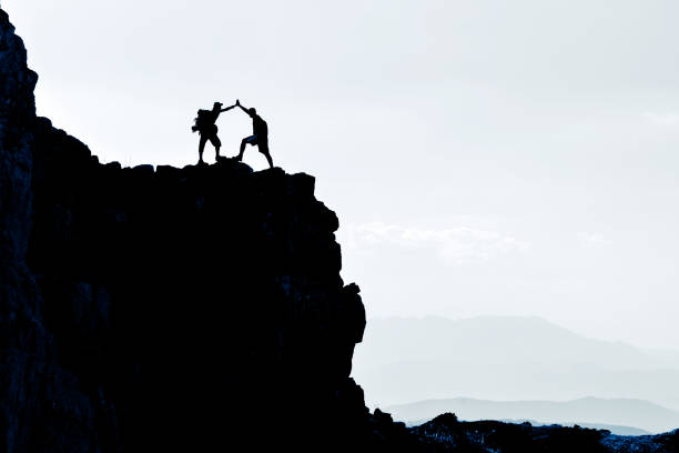 istock high mountain range and rocky mountain climbers 1382757493