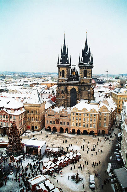 Prague in winter - central market place. Central market place of Prague / Czechia with christmas market and church. prague christmas market stock pictures, royalty-free photos & images