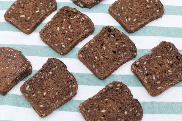 istock Pieces of brown bread 1382759999
