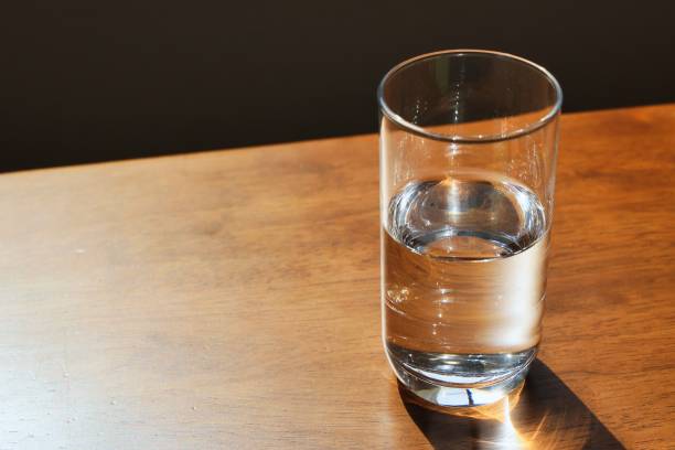 istock A cup of water placed on the table 1382764463