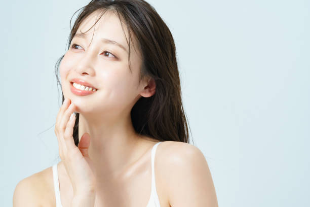 istock young woman with good skin gloss 1382766994