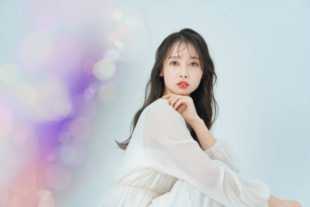 istock woman with make-up and colorful front bokeh 1382767546