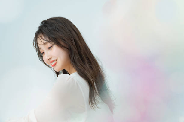 woman with make-up and colorful front bokeh