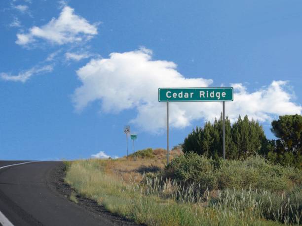istock Roadside signs with speed limit approaching Cedar Ridge, Utah 1382768850