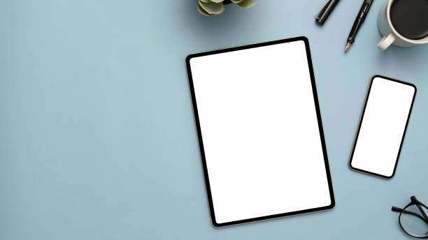 Pastel blue workspace background with tablet and smartphone mockup