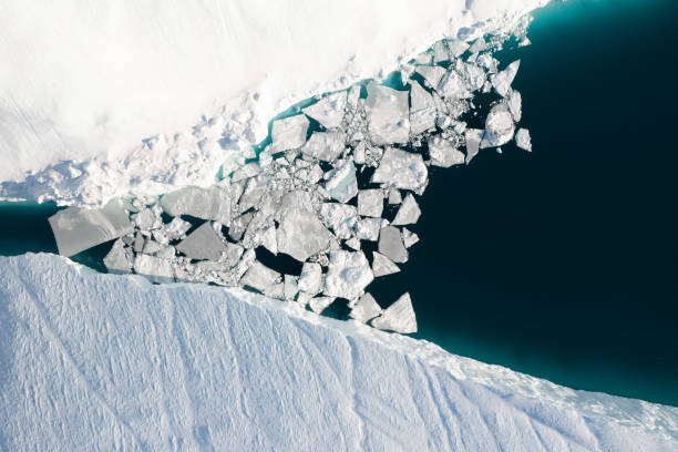 istock Big icebergs floating over sea from aerial view 1382790992
