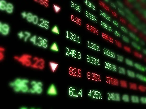 Stock market ticker board blurred at edges