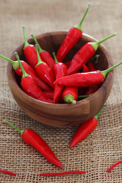istock Red hot pepper in wooden bowl 138279245