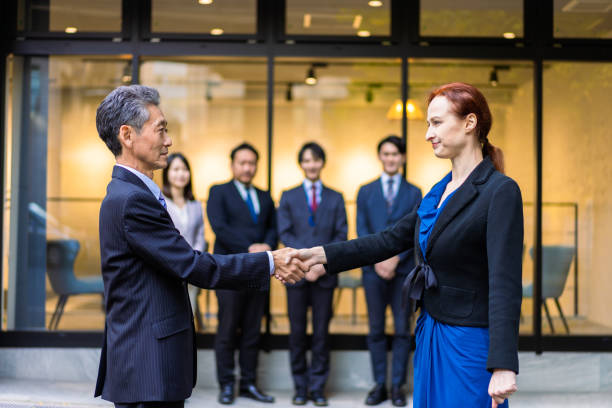 istock Business people signing global contracts 1382808894