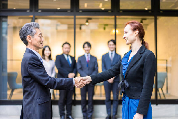 istock Business people signing global contracts 1382808895