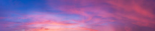 istock Dramatic panorama sky with cloud on sunrise and sunset time. 1382808992