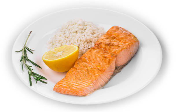 istock Grilled salmon steak with rice. 1382813850