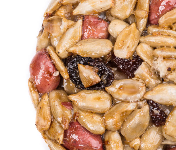 Cookies made of candied roasted peanuts and sunflower seeds.