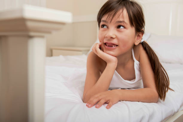istock Cute girl bedroom portrait 1382814295