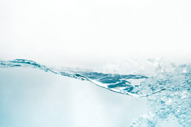 istock water surface isolated on white. abstract liquid nature texture background 1382830324