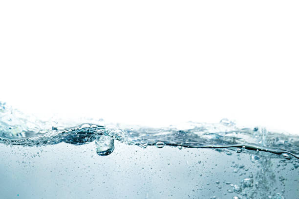 istock water surface isolated on white. abstract liquid nature texture background 1382831350