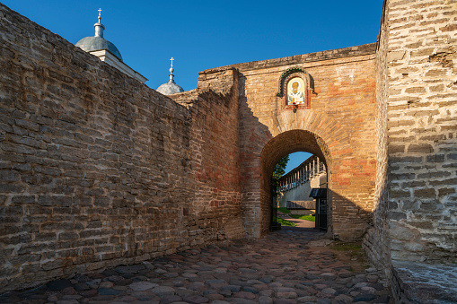 The main entrance to the Izborsk fortress Nikolsky Gate on a sunny summer day, Izborsk, Pskov region, Russia