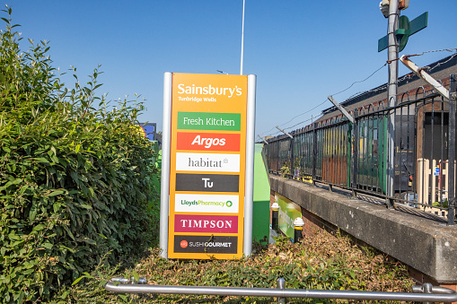 Sainsbury's Sign on Linden Park Road at Royal Tunbridge Wells in Kent, England , with other stores mentioned.
