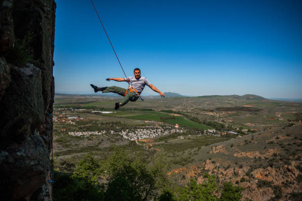 istock Rock climber on a face of a cliff face 1382860971