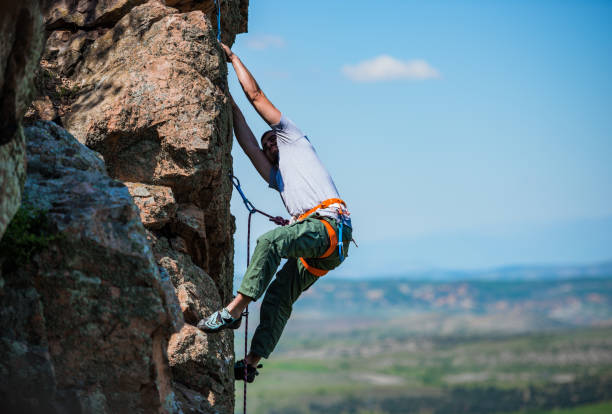 istock The climber trains on a natural relief 1382864212
