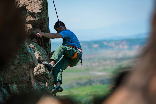 istock Rock climber on the mountain 1382864222