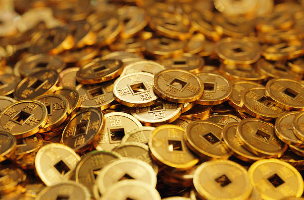 istock Chinese fortune coins in gold 1382868326