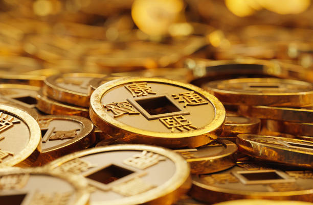 istock Chinese fortune coins in gold 1382868327
