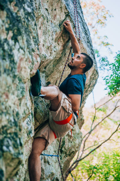 istock The climber trains on a natural relief 1382868879