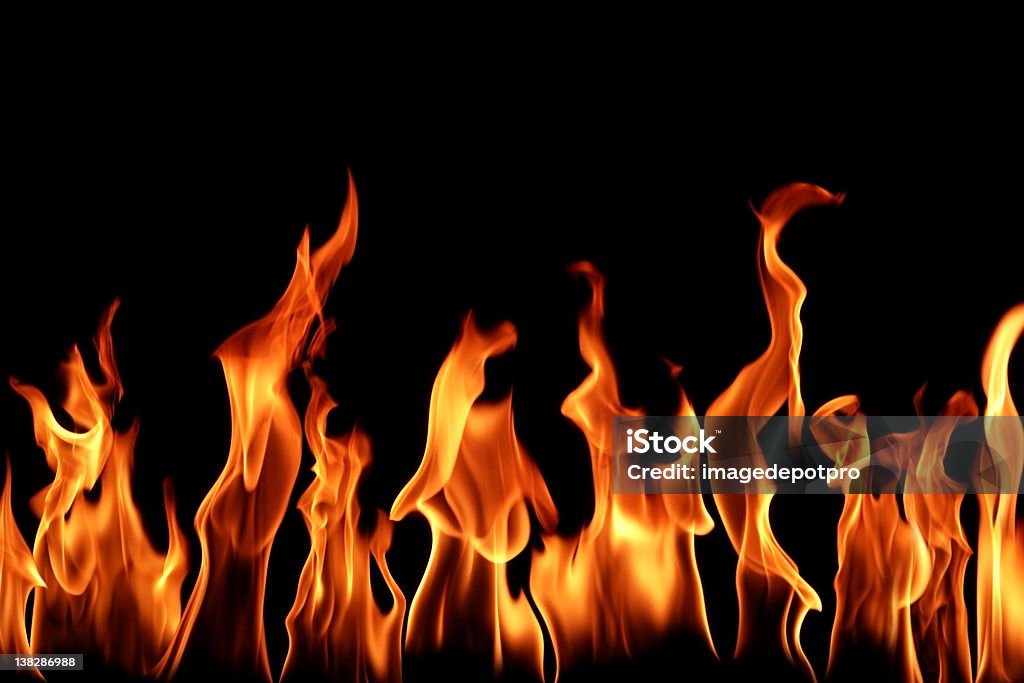 薪の暖炉の炎 - Dangling a Carrot 英語の慣用句のロイヤリティフリーストックフォト